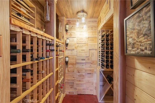 wine cellar with wood ceiling and wooden walls