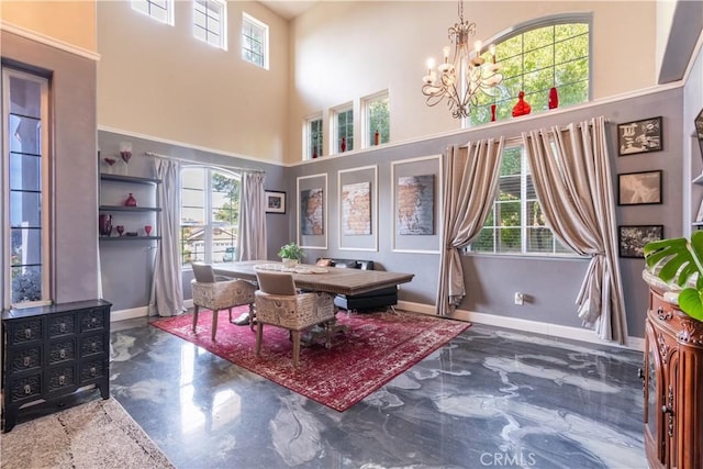 interior space with a high ceiling and a chandelier