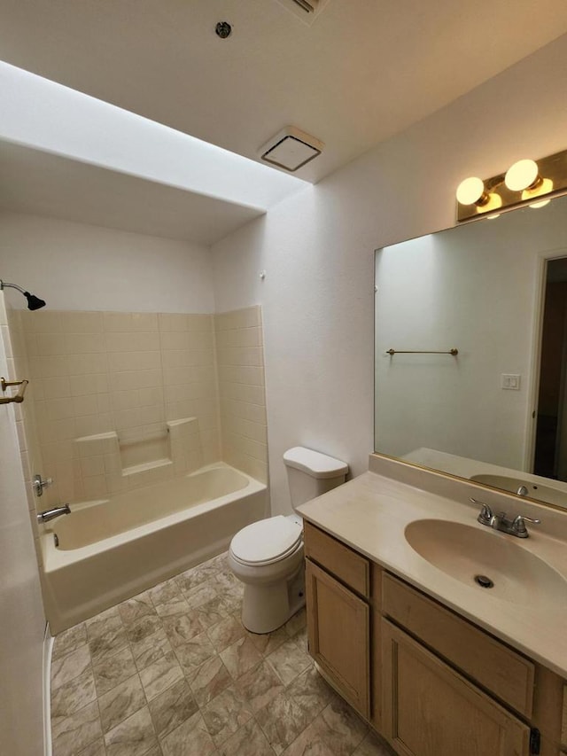 full bathroom with vanity, toilet, and shower / bathtub combination