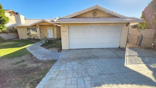 single story home with a garage