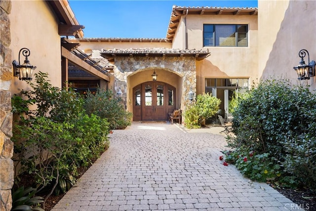 view of exterior entry with french doors