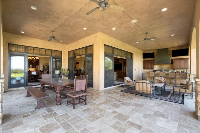 view of patio with ceiling fan