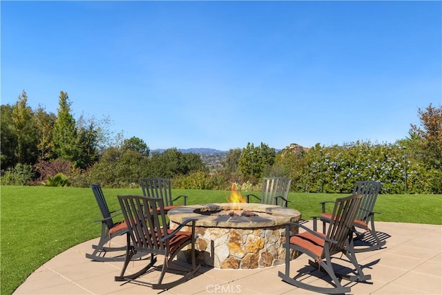 view of patio featuring a fire pit