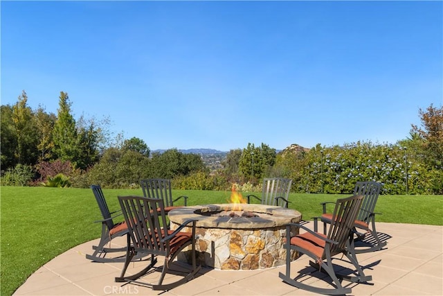 view of patio / terrace featuring a fire pit