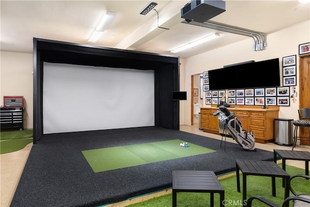 playroom featuring carpet flooring and golf simulator