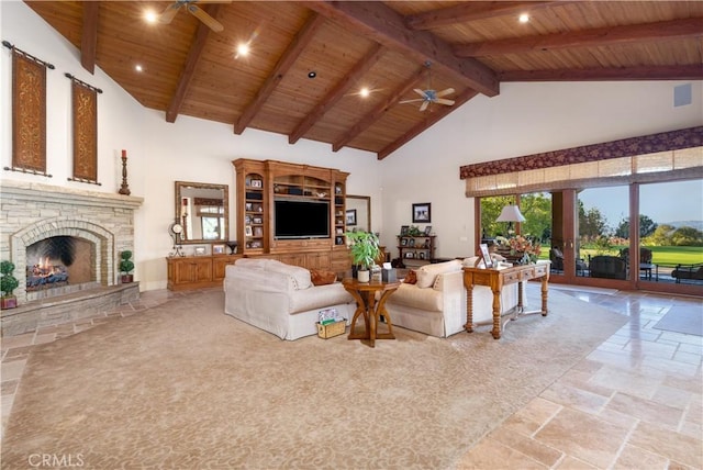 living room with beam ceiling, a fireplace, high vaulted ceiling, and wood ceiling