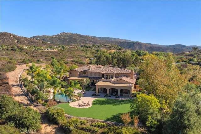 aerial view featuring a mountain view