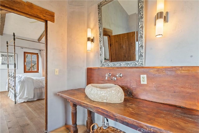 bathroom featuring wood-type flooring