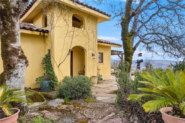 doorway to property featuring a mountain view