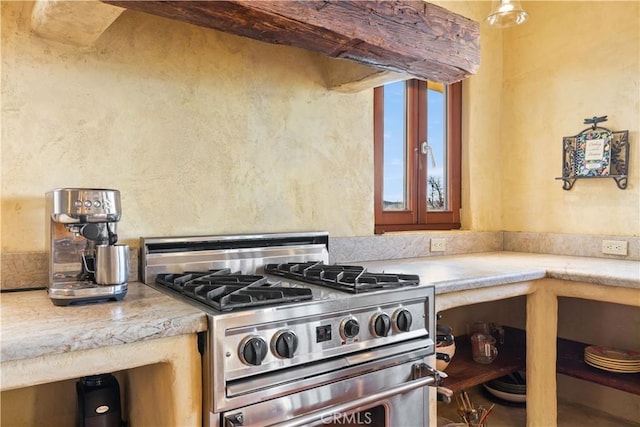 kitchen featuring stainless steel range with gas stovetop