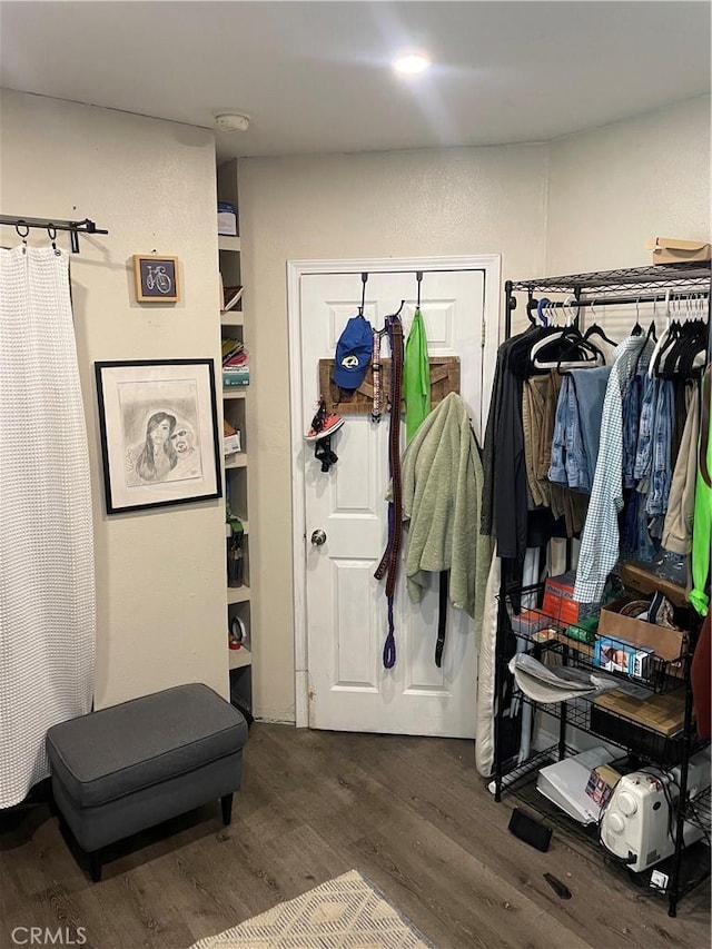 interior space with hardwood / wood-style flooring