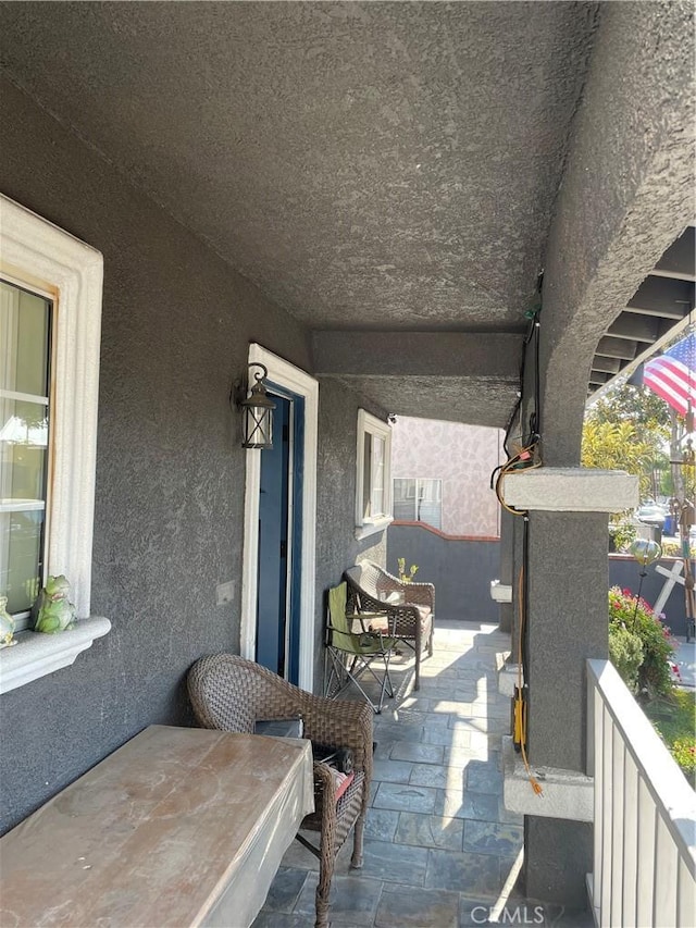 view of patio featuring covered porch