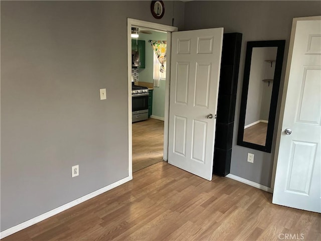 unfurnished bedroom featuring light hardwood / wood-style floors