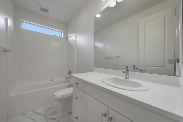 full bathroom with bathtub / shower combination, vanity, and toilet