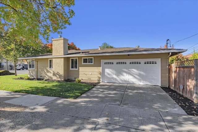 ranch-style home featuring a garage and a front lawn