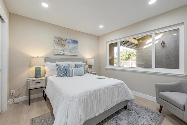 bedroom featuring light wood-type flooring