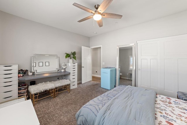 carpeted bedroom with ceiling fan