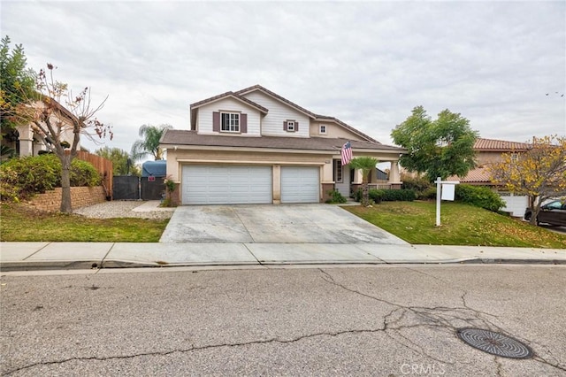 front of property featuring a garage and a front lawn