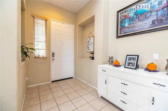 view of tiled foyer entrance