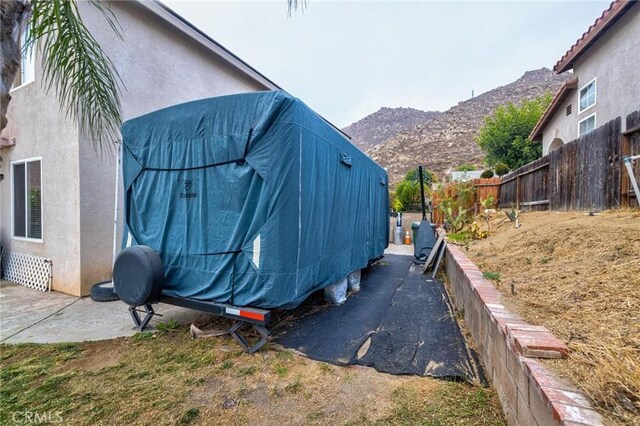 view of side of property featuring a mountain view