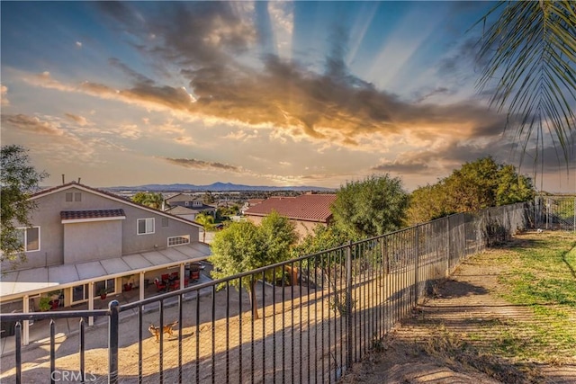 view of yard at dusk