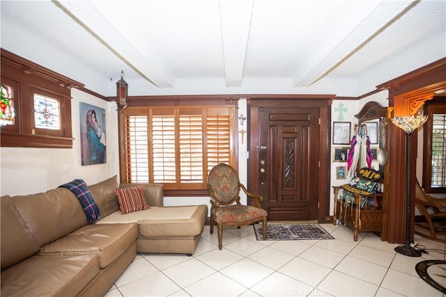 tiled living room with beam ceiling and a healthy amount of sunlight