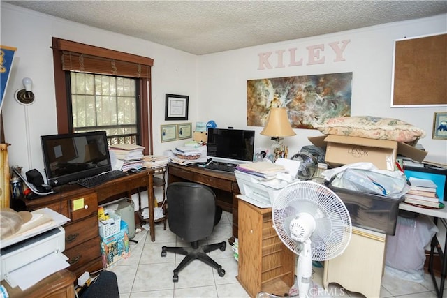 tiled office space with a textured ceiling