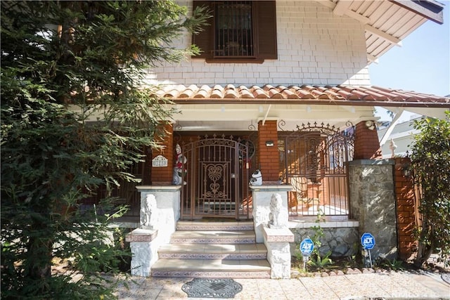 entrance to property with covered porch