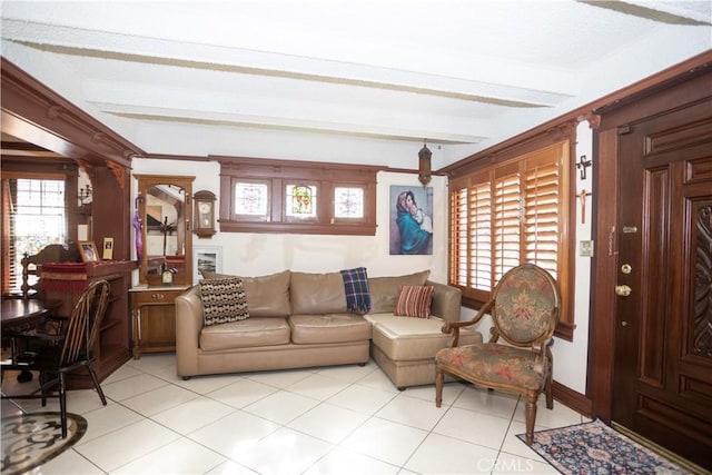 living room featuring beamed ceiling