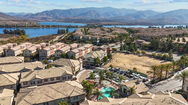 bird's eye view featuring a water and mountain view