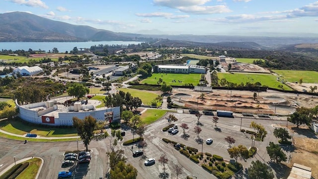 bird's eye view featuring a water and mountain view