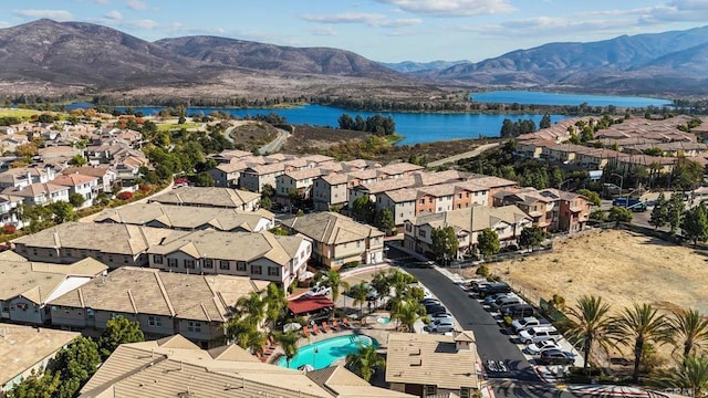 bird's eye view with a water and mountain view