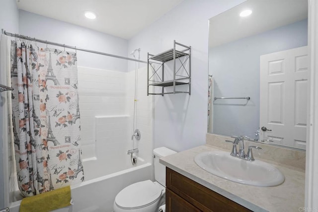 full bathroom with shower / bath combo, vanity, and toilet