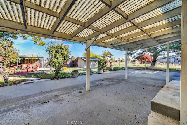 view of patio / terrace featuring a shed