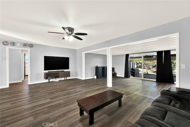 1938 Colusa, Corning, CA 96021 - living room featuring a ceiling fan and dark wood finished floors