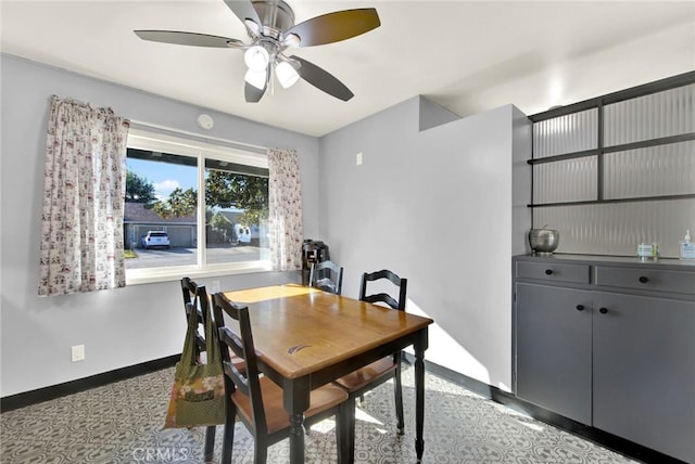 dining space with ceiling fan