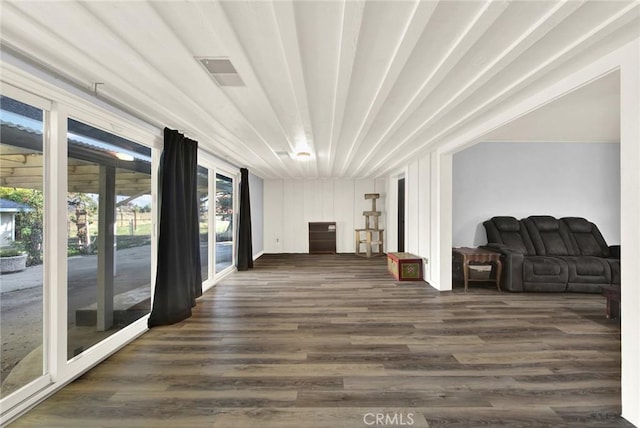 hall with dark hardwood / wood-style floors