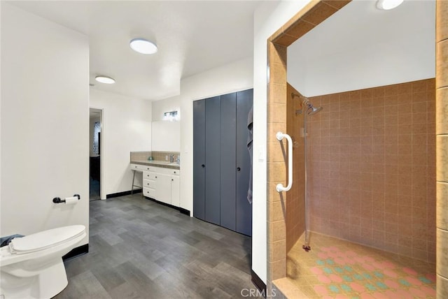 1938 Colusa, Corning, CA 96021 - full bath with a tile shower, vanity, and wood finished floors
