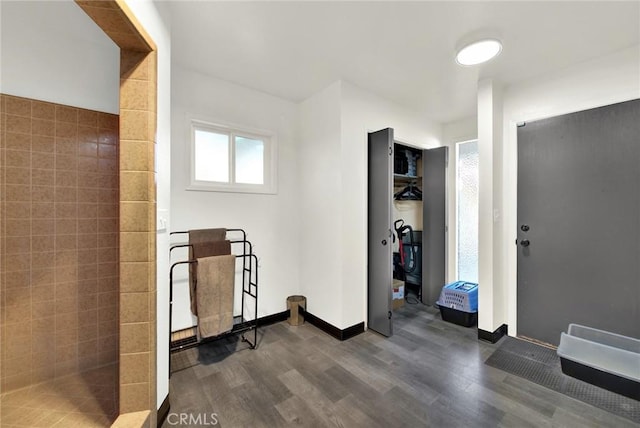 workout room with hardwood / wood-style flooring