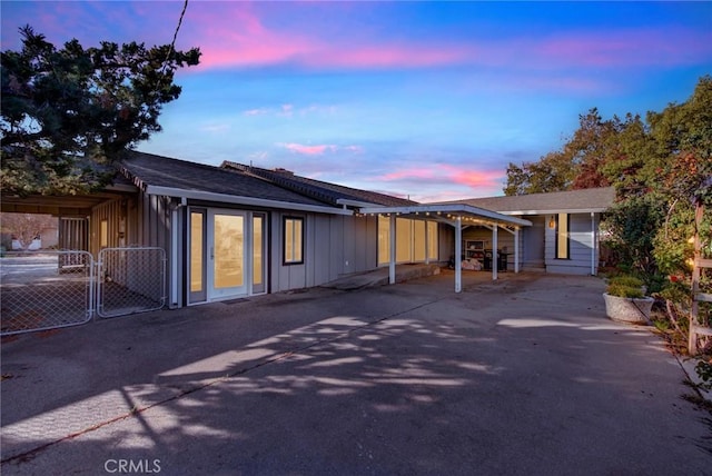 1938 Colusa, Corning, CA 96021 - view of front of home featuring a gate, board and batten siding, and roof with shingles