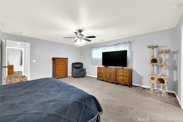 bedroom with ceiling fan and carpet