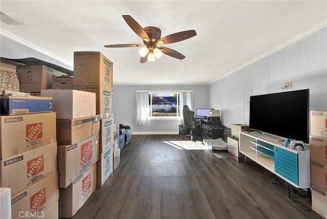 office space with ceiling fan, dark hardwood / wood-style flooring, and crown molding