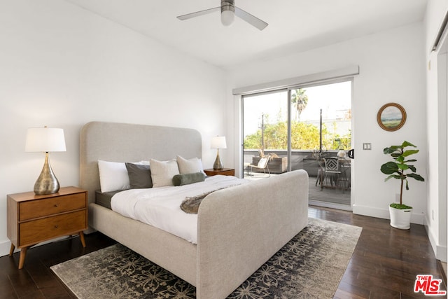 bedroom featuring dark hardwood / wood-style floors, ceiling fan, and access to outside