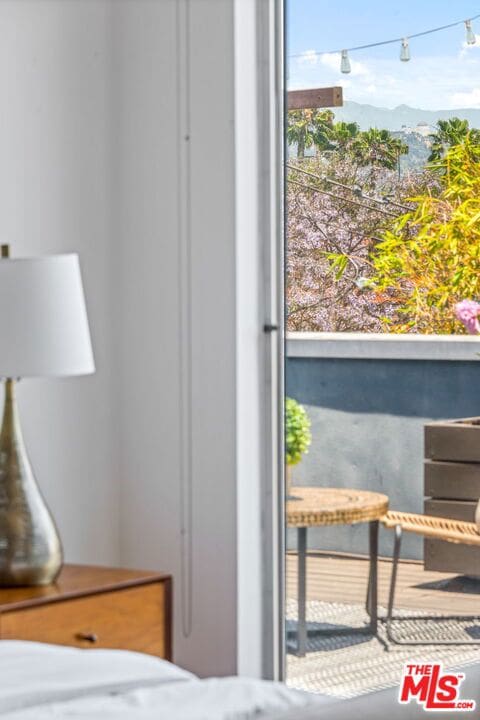 bedroom featuring a mountain view