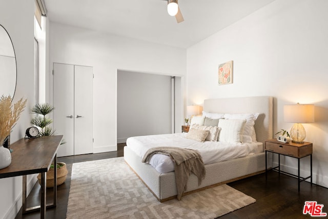 bedroom featuring dark hardwood / wood-style flooring and ceiling fan