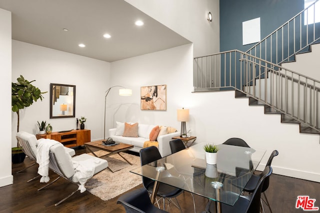 living room with dark wood-type flooring