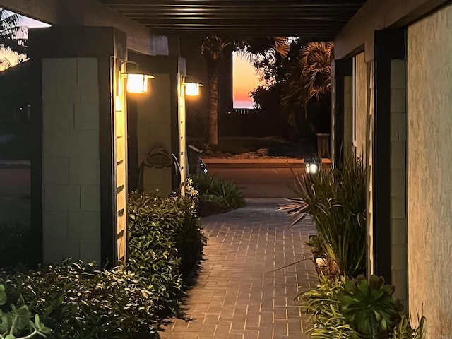 view of patio terrace at dusk