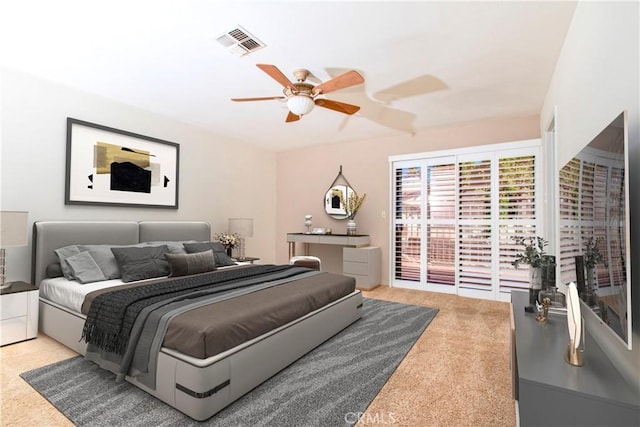 bedroom with access to exterior, ceiling fan, and light carpet