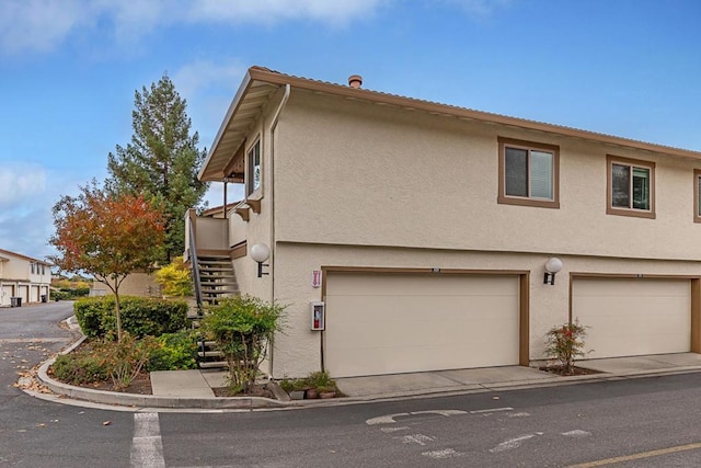 exterior space with a garage