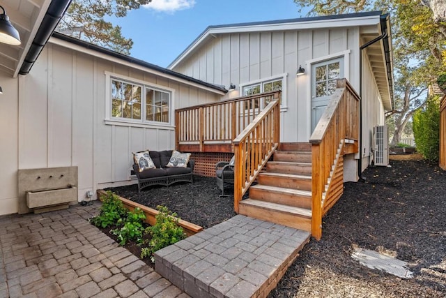 entrance to property with a wooden deck